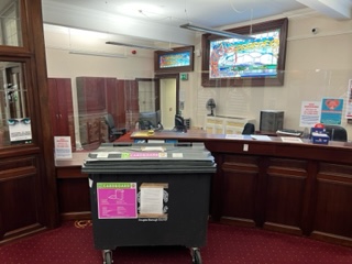 Douglas man protests to overflowing bins by wheeling a bin into Douglas Town Hall