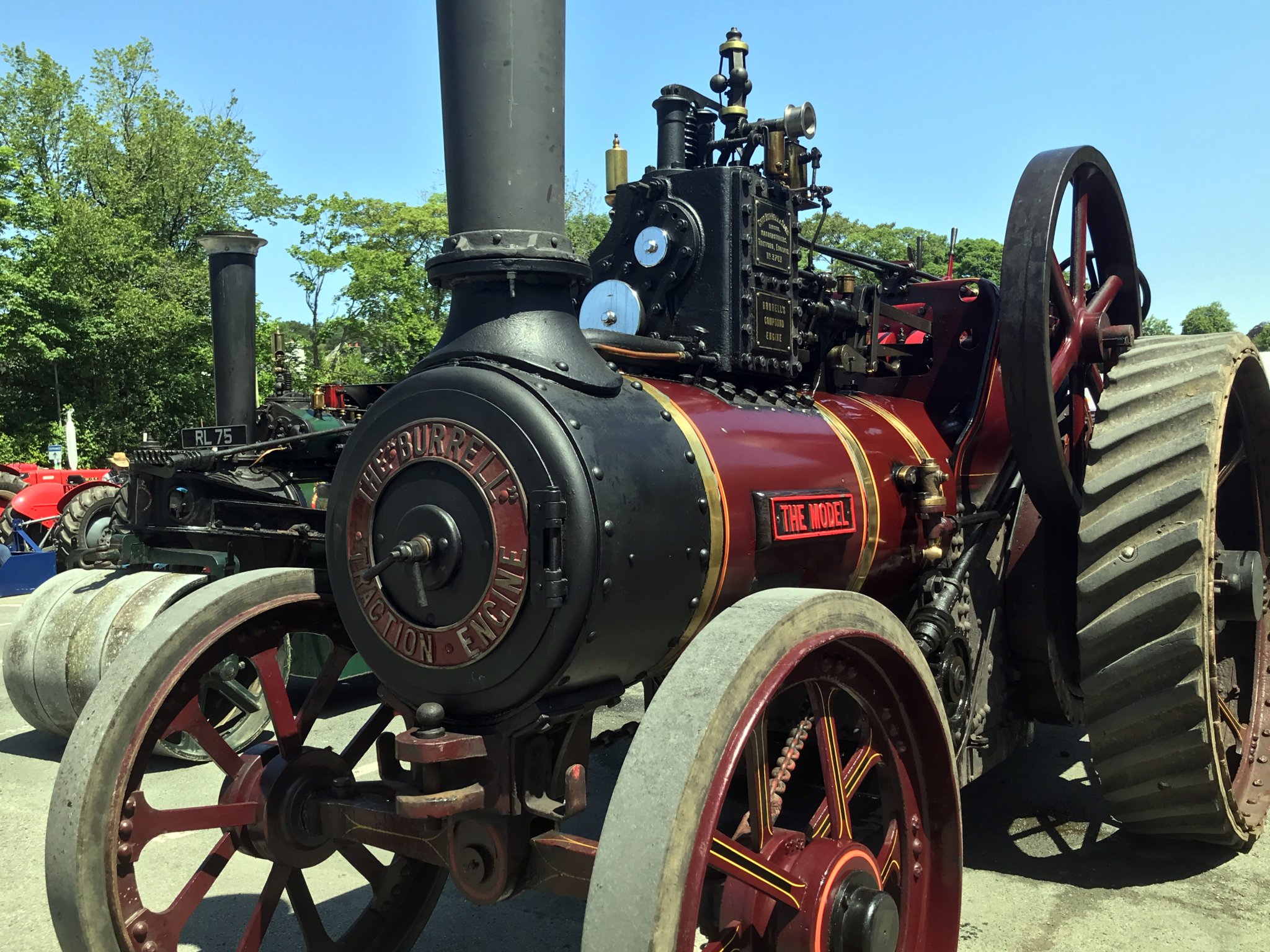 Above, Matt Young of Lamerton with sons Ruben and Jack and their pride and joy, a steam engine more than 100 years old; left, Stephen and Clare Fryer of RAF Harrowbeer, with the RAF staff car which once transported officers around airfields during the Second World War; Graham Skinner,left, and Matt Dart with The Bullet.