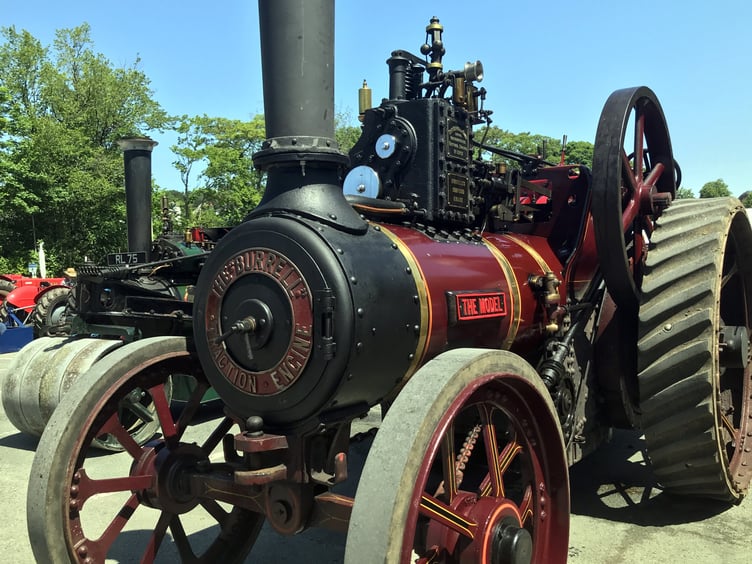 Above, Matt Young of Lamerton with sons Ruben and Jack and their pride and joy, a steam engine more than 100 years old; left, Stephen and Clare Fryer of RAF Harrowbeer, with the RAF staff car which once transported officers around airfields during the Second World War; Graham Skinner,left, and Matt Dart with The Bullet.