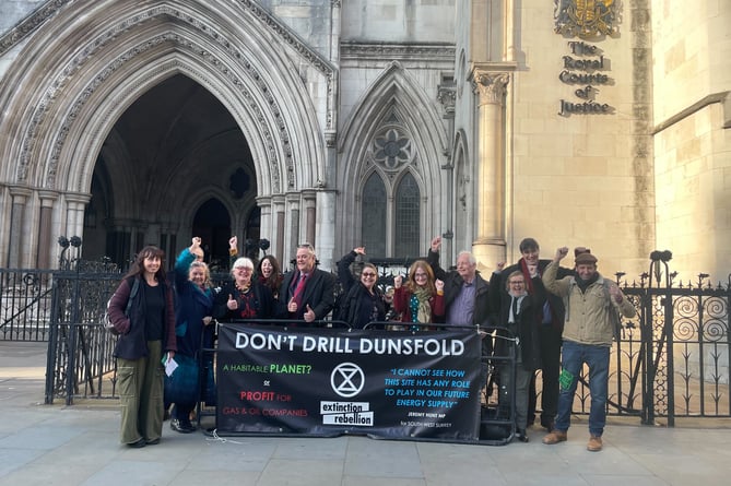 Protect Dunsfold campaigners celebrating outside the Royal Courts of Justice in March, after winning permission for their judicial review
