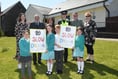 Pupils tell motorists to ‘slow Dhoon’