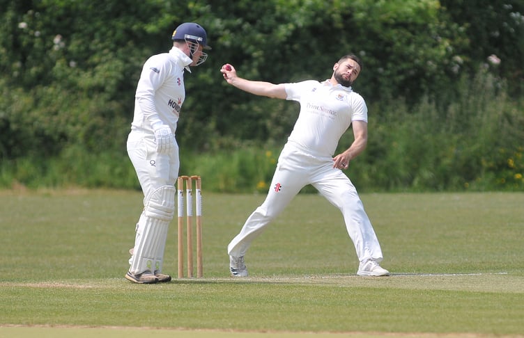 Devon Cricket League Division B. Chudleigh versus Ipplepen. Chudleigh's Will Heather bowling