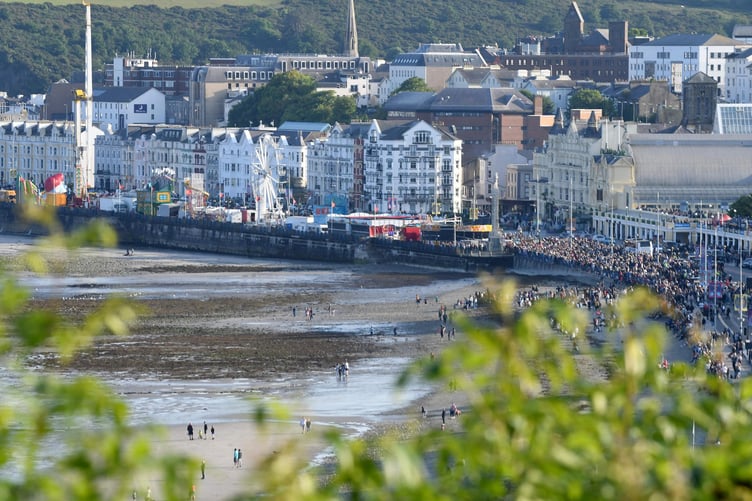 Crowds watching the red arrows display over Douglas -