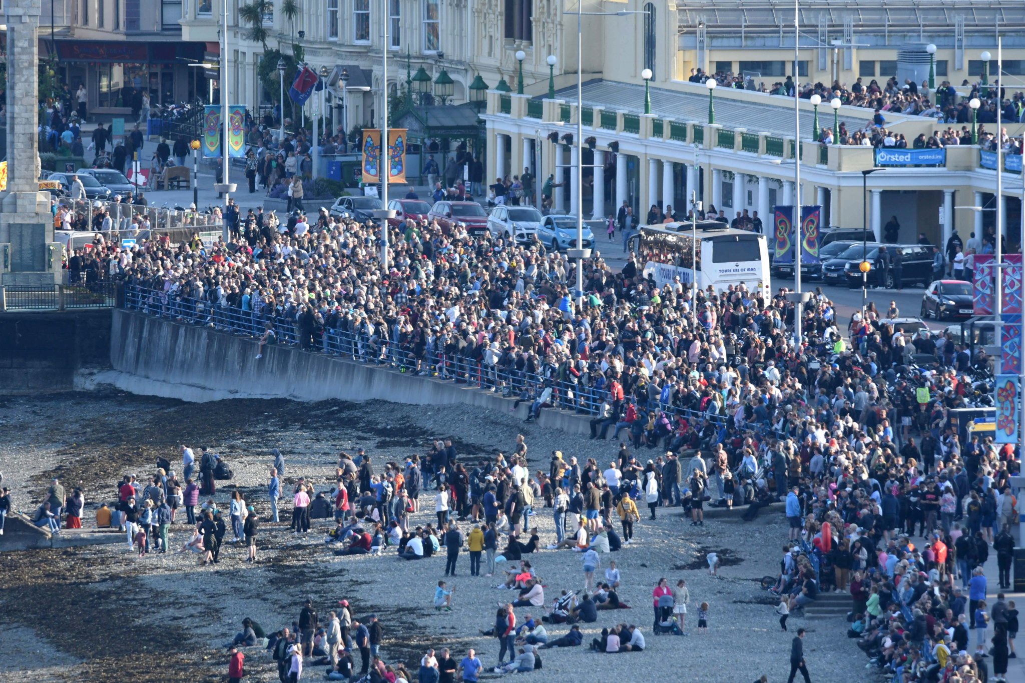 Crowds watching the red arrows display over Douglas -
