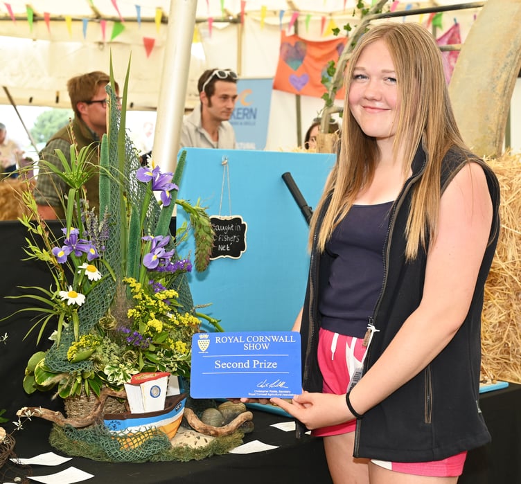 It was the first time Holly Ferguson of Delabole had entered an exhibit in the YFC marquee and she took second place with her floral art display entitled “Caught in a Fishers Net”
