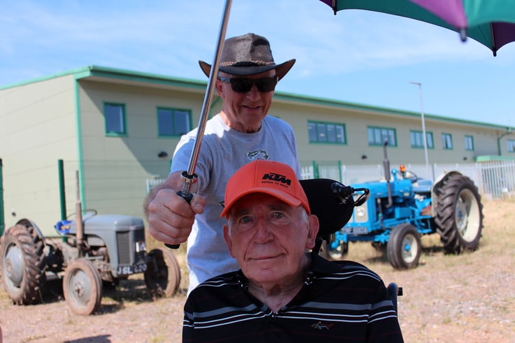 At Mole Avon was Bob Adams of Crediton who has MND having a sun umbrella held over him. SR 8038