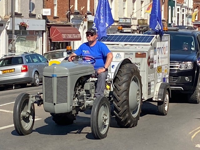 Pete driving up through Crediton High Street. NP 150623 01