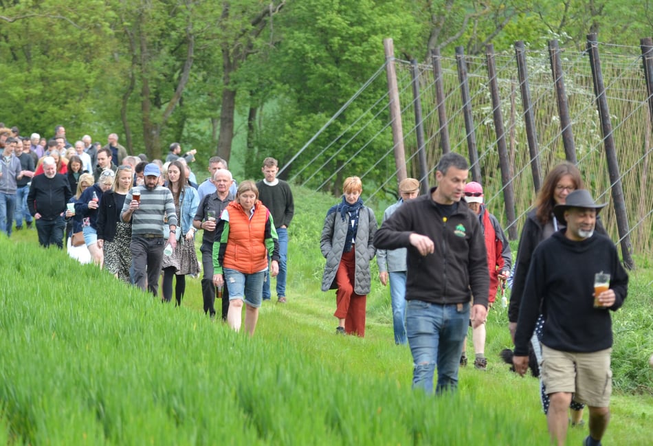 <p>Head brewer Miles Chesterman (third from right) joins the ‘Beating the Bounds' walk</p>