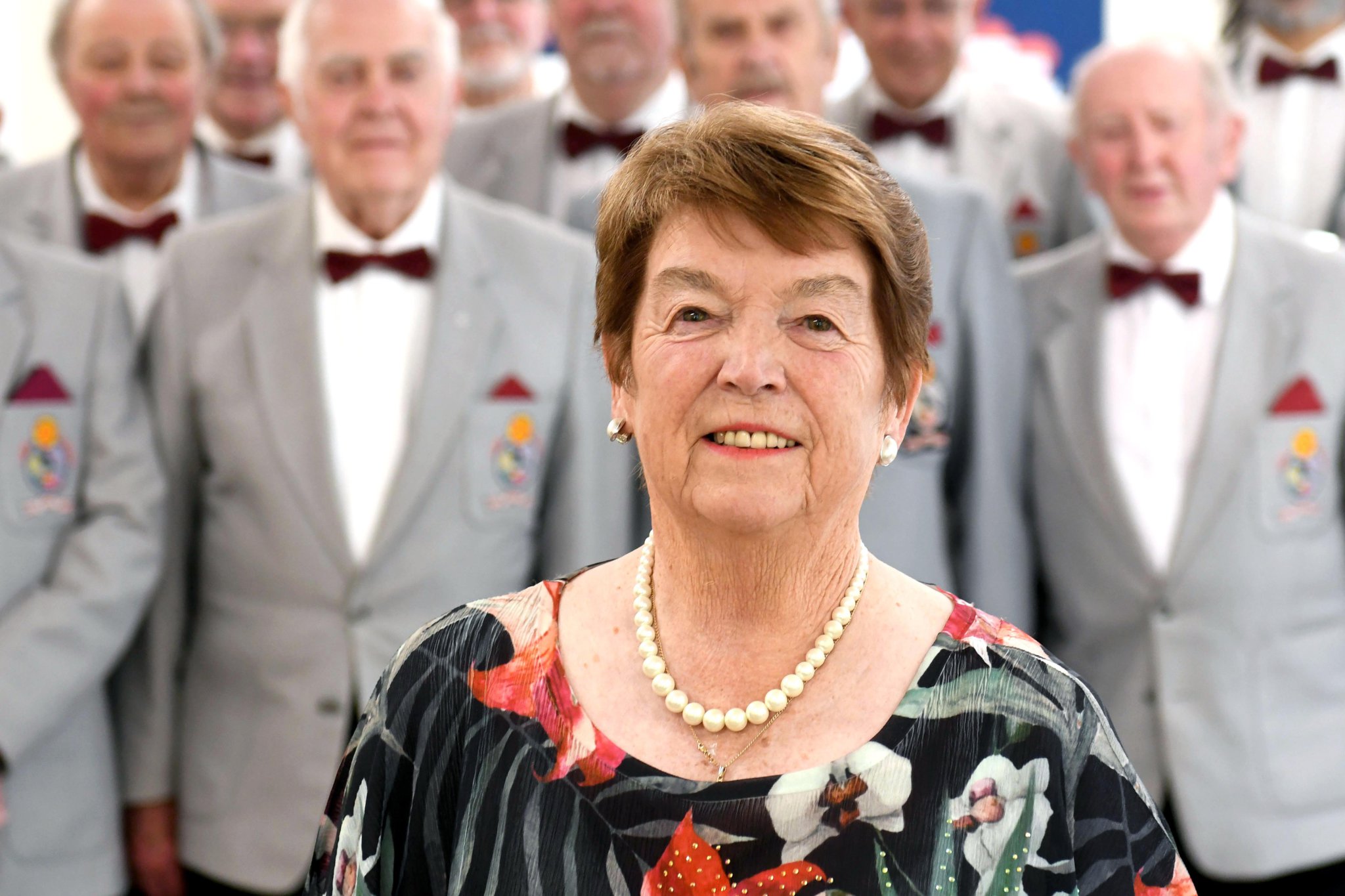Wendy McDowell (centre) is stepping down from the Lon Dhoo Male Voice choir after 35 years as the choir’s musical director.
