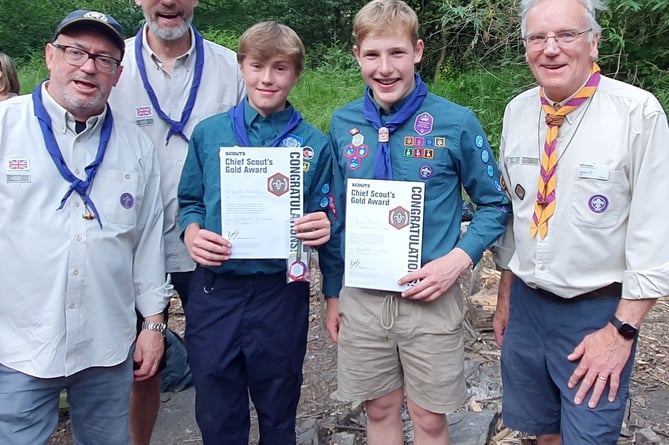Left to right: Scout Leader David Reckord, Assistant Scout Leader Steve Rose, Scout Ed Nayler, Scout Jacob Brewer, Haslemere Scouting District Commissioner Keith Clayton