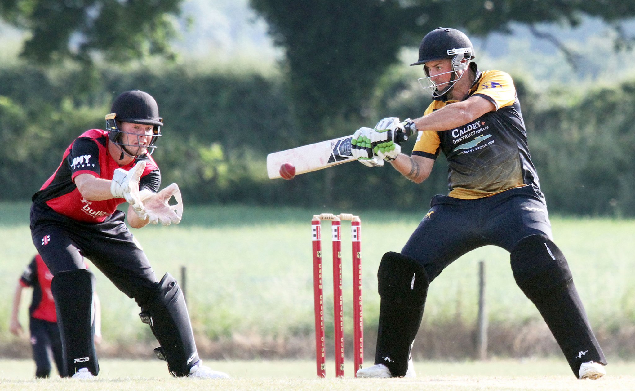 Troy Purslowe strikes the ball to the boundary on his way to topscore with 71 in Lawrenny's victory over Carew.