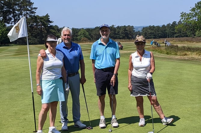 Hindhead golf club Winning Team just coming off the 18th hole.  Captain of Hindhead Geoff Sullivan second from the left.