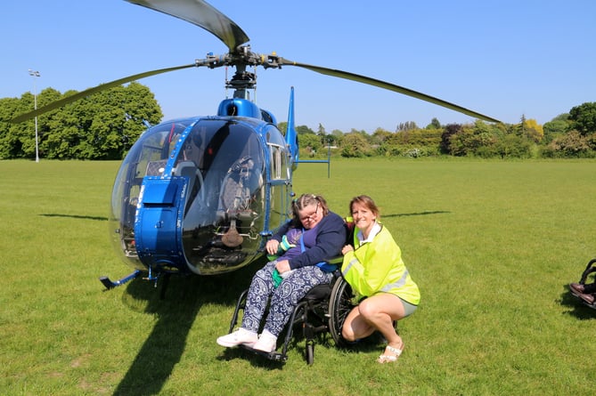 Seventy disabled participants and their volunteer carers enjoyed helicopter trips from Monkton Lane to Tilford