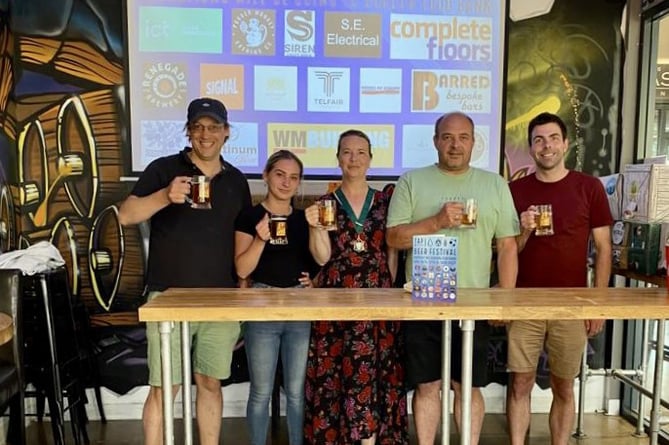 Bordon Beer and Cider Festival, Tap at The Shed, Bordon, June 16th 2023. From left: Tap owner Ed Spice, Tap assistant manager Bonnie Wright, Cllr Catherine Clark, Simon Sharpe of S E Electrical and Cllr Andy Tree.