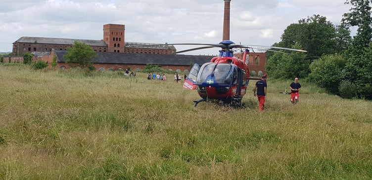 Helicopter crew with the Devon Air Ambulance in Fox's Field, Wellington.
