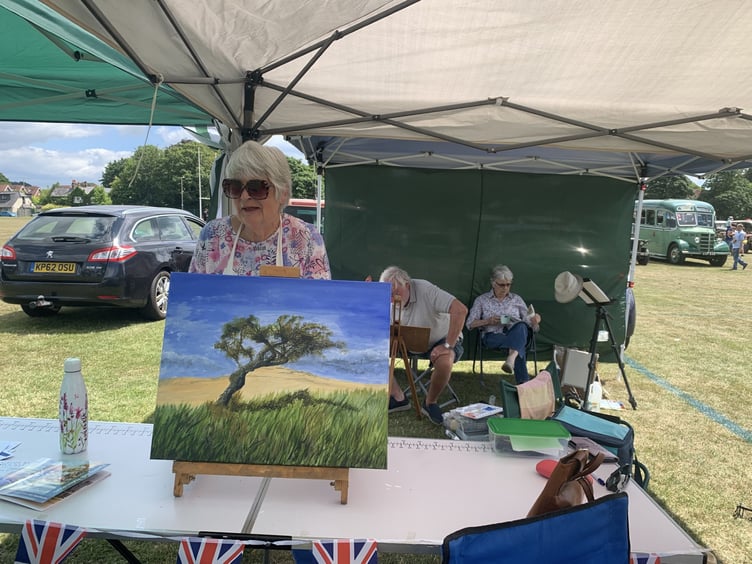 Members of the Alton Art Society show off their work in Anstey Park, June 24th 2023.
