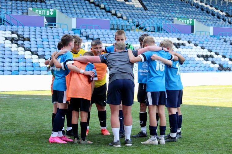 JK Academy under-13s won the 'Play on the Pitch' tournament at Elland Road