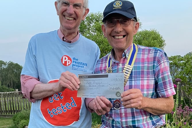 David Whitby of the Prostate Project with Paul Mills, Chair of Haslemere Rotary Club presenting a cheque for £4,000