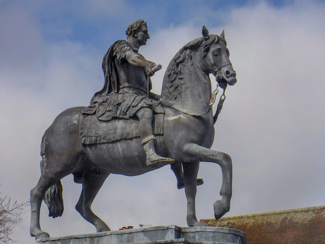 <p>Petersfield's King William III statue looks over the Square before its removal</p>