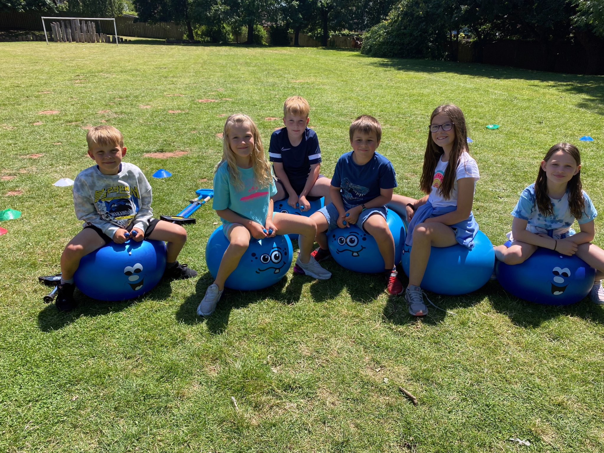 Some of the children from Landscore Primary School who took part in a sponsored bounce to raise funds for a new decking area. NP 070723 01