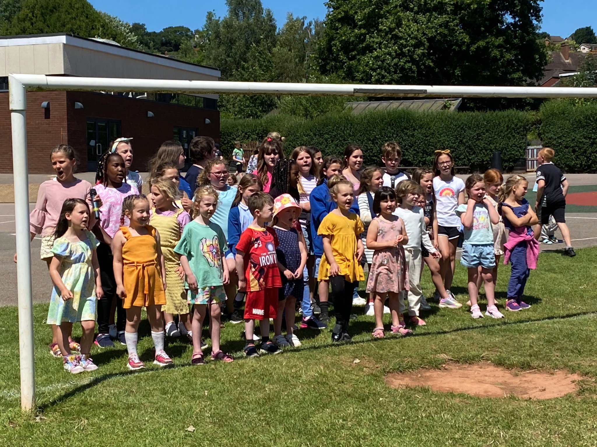 Landscore School Choir entertained visitors with a number of songs at the picnic on the school field. NP 070723 04