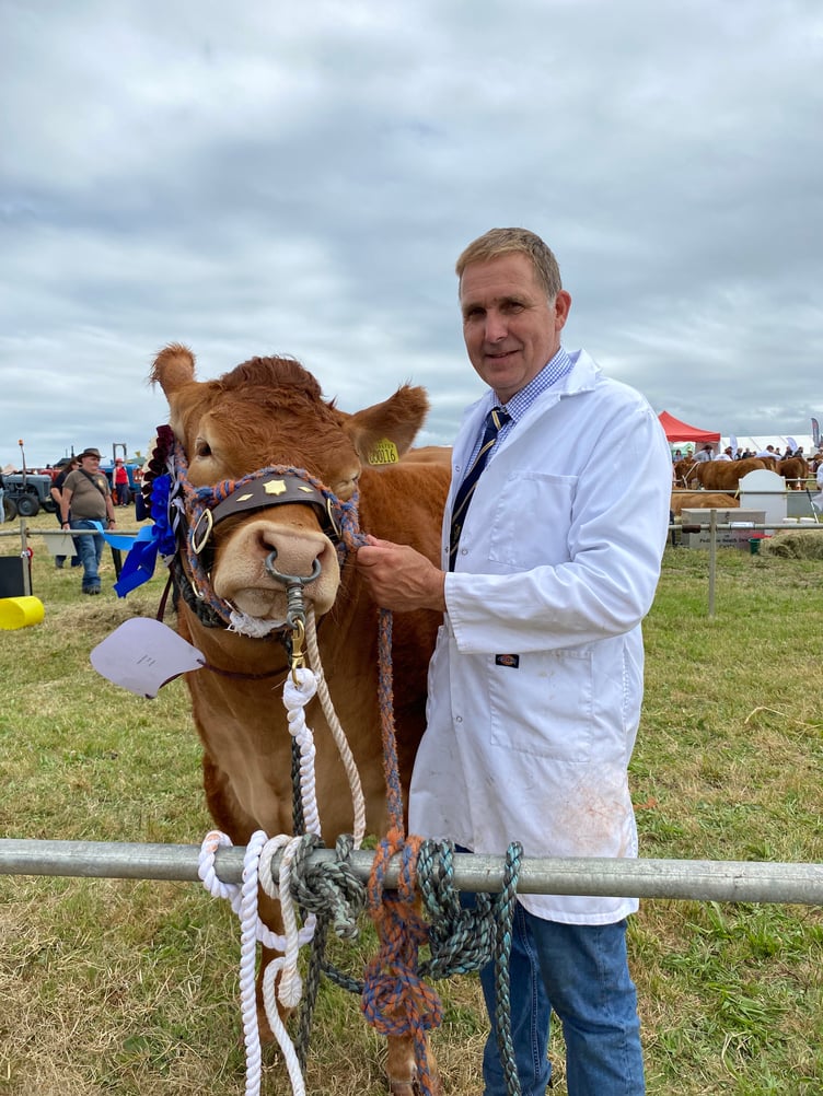 Micheal Kirby from Holsworthy is pictured here with Koojan Sugarbabe who was crowned champion continental in the any continental beef rreed or cross heifer born before 1.1.2022. Micheal also won champion commercial with another cow called Millie. Micheal said: “It feels fantastic – we need to help keep the local shows going.”