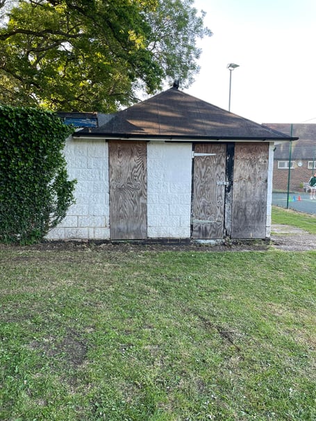 The old changing rooms at Elstead's Burford Lodge recreation ground have been boarded up for several years