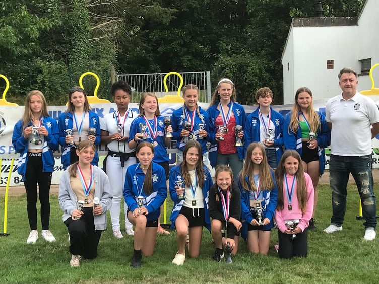 Crediton Youth U12 girls Devon Girls league runners-up with their coach Simon Penney.