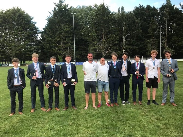 Crediton Youth FC U16’s with their coaches Adrian Harvey and Steve Lethbridge.