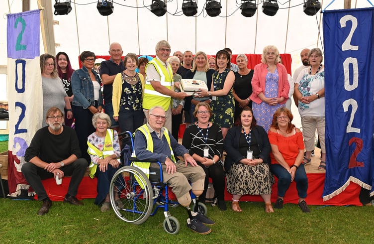 Andrew Stacey outgoing chairman of the Delabole Carnival for over 20 years with past and present members of the Delabole Carnival Committee