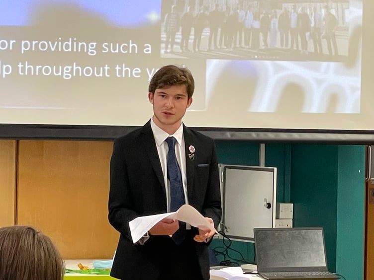 Young Ambassador Theo speaking during the ceremony. AQ 2600