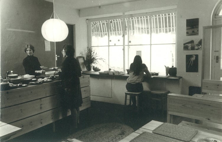 Belle Collard at the counter back in the early days