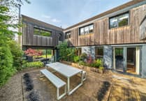 Architect-designed home to rent sits in "idyllic" location - and has two gardens 