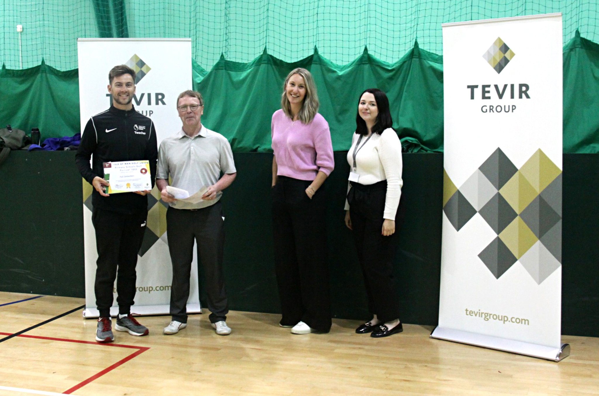 (Left to right) Peel Clothworkers year six teacher Joe Crookall, Isle of Man Golf’s Andy Patterson along with Jess Edmonds and Katie-Anne Simpson both from Chip n Putt sponsor Tevir Group