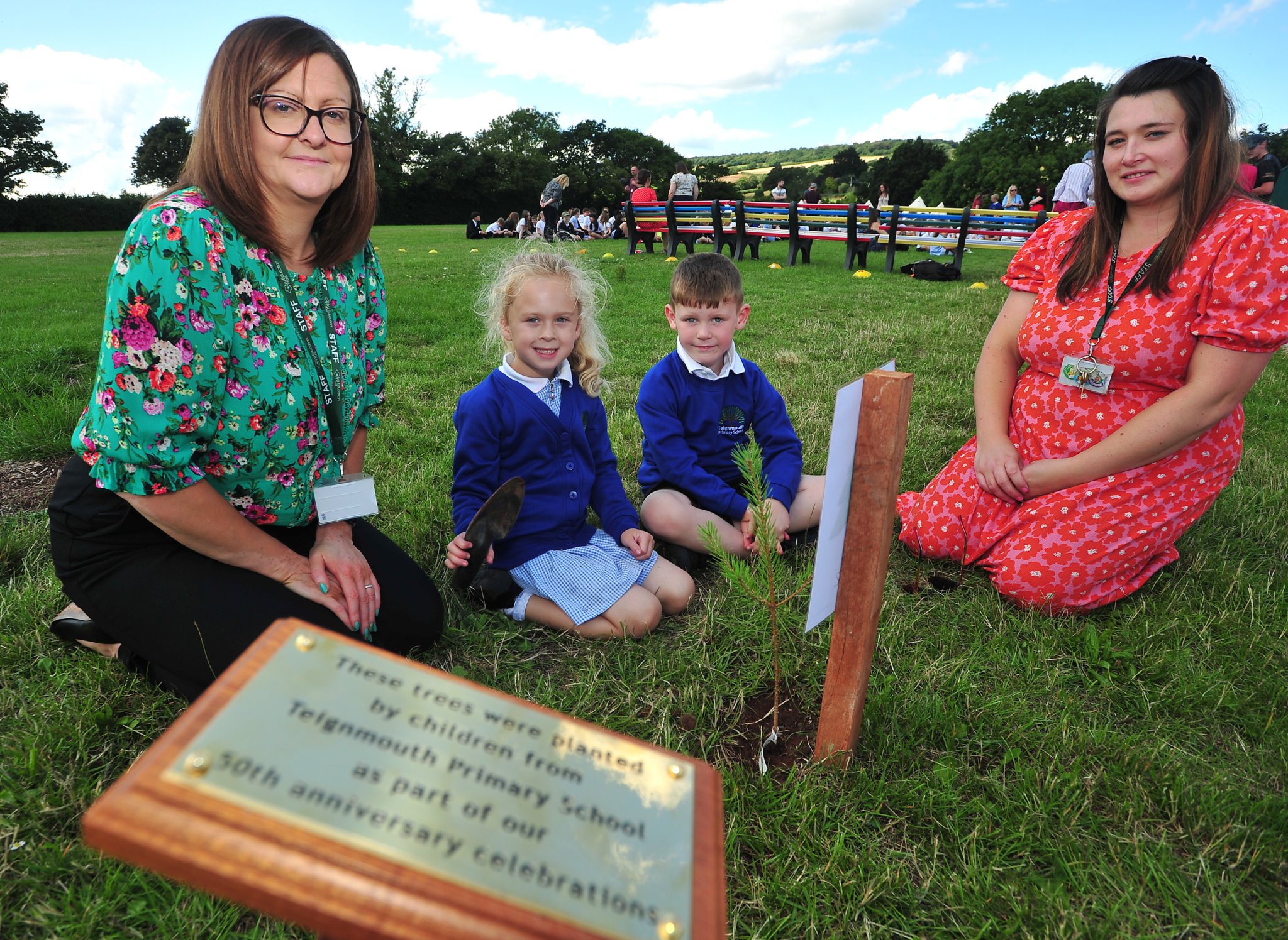 ABOVE RIGHT: 50th anniversary tree planting. Pupils Alexa and Charlie with Ivy Trust CEO Katy Quinn and Key Stage Leader Charlotte Gobel.
RIGHT: At Teignmouth Primary School 50th anniversary tree planting. Showing off their new Teignmouth Primary School jumpers are pupils Rory, Lottie-Mai, Freddie, Erin and Audrey.
Pictures: Steve Pope