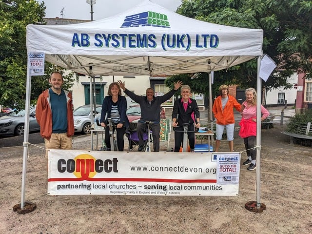 Some of the Connect schools work team and volunteers during the 12-hour cycle challenge in Crediton Town Square.