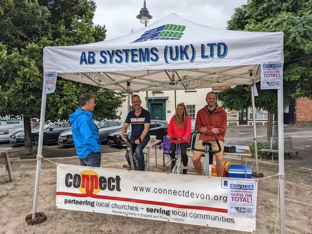 Some of the Connect schools work team and volunteers during the 12-hour cycle challenge in Crediton Town Square.
