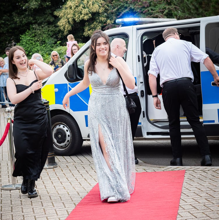 Some of the students who arrived at their Summer Ball in the back of a police riot van. Images by Rory Oliver Photography.