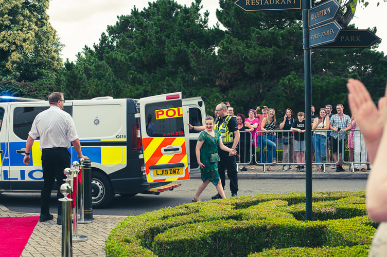 Some of the students who arrived at their Summer Ball in the back of a police riot van. Images by Rory Oliver Photography.