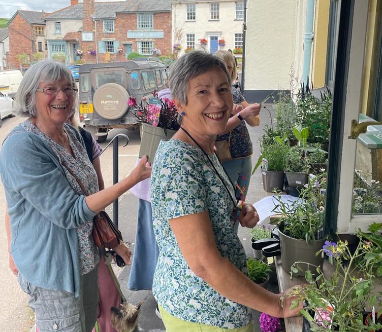 It was busy around the flowers on sale at Sandford Community Stores.