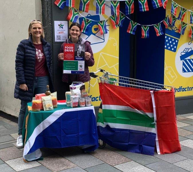 Vanessa Naude (Isle Settle) and daughter Kiara Shnier volunteering for the Mandela Day Food Drive in aid of Isle of Man Foodbank