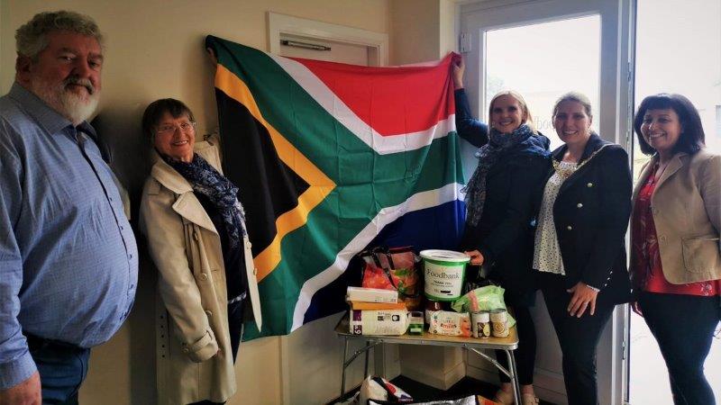 Neal Mellon (Co-Founder/Director at Isle of Man Foodbank), June Whiteman (IOM Chapter of SA Chamber of Commerce UK), Vanessa Naude (Isle Settle), Cllr Natalie Byron-Teare and Madina Sharpe (IOM Foodbank)