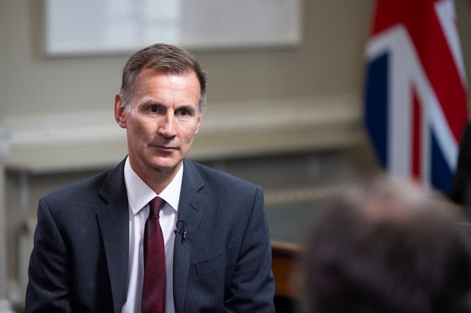 Chancellor Jeremy Hunt is interviewed by Robert Peston in his office at His Majesty's Treasury
