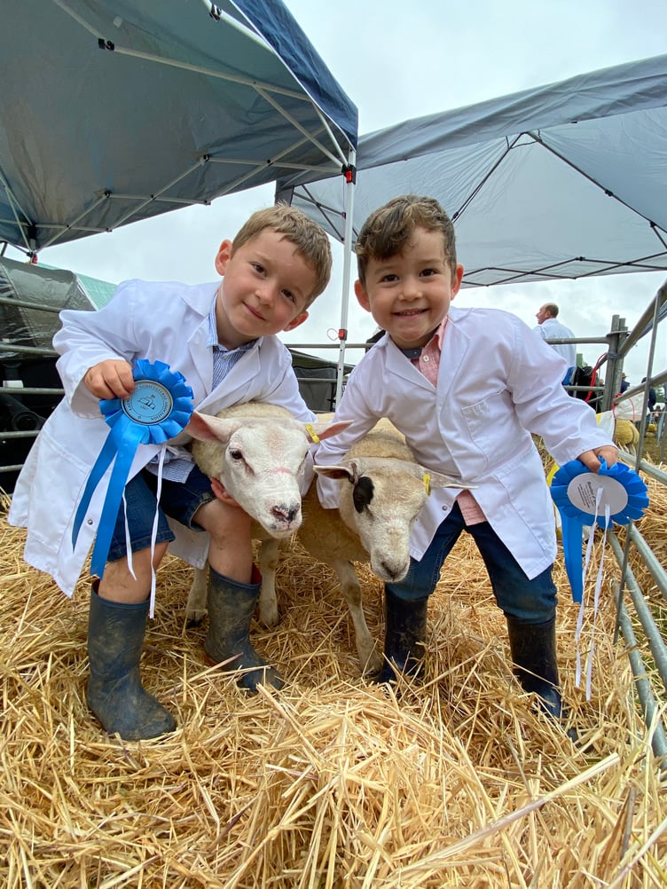 Jago, 5, and Lowen, 3, Renfree from Altarnun were both given rosettes for their participation in the young handlers class. The two brothers both chose their own lambs to take into the ring. Gwen Renfree, the boys grandmother, won reserve champion with her Roussin ram