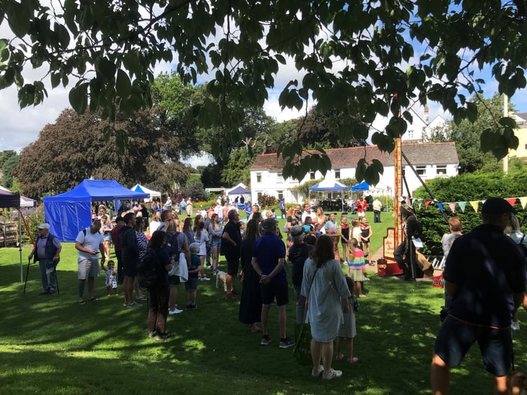 Crowds gather for the ‘try your strength’ game