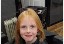 Seven-year-old donates her hair to charity