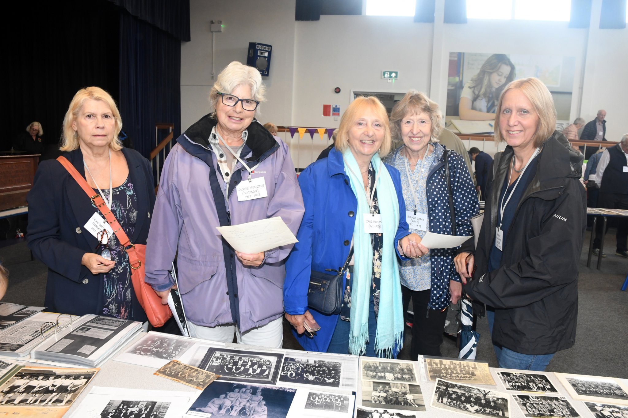 Jean Dickinson, Jackie Menzies, Jane Monks, Brenda Dadds and Caroline Newcombe with some school photographs.