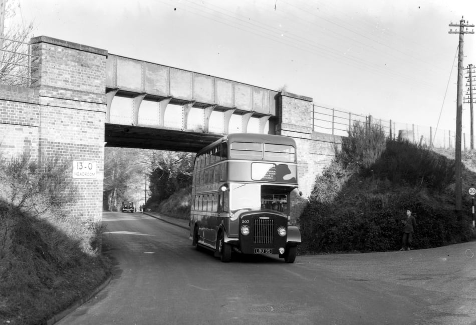 <p>The 'first double decker bus through Wrecclesham bridge', photographed early in 1954</p>