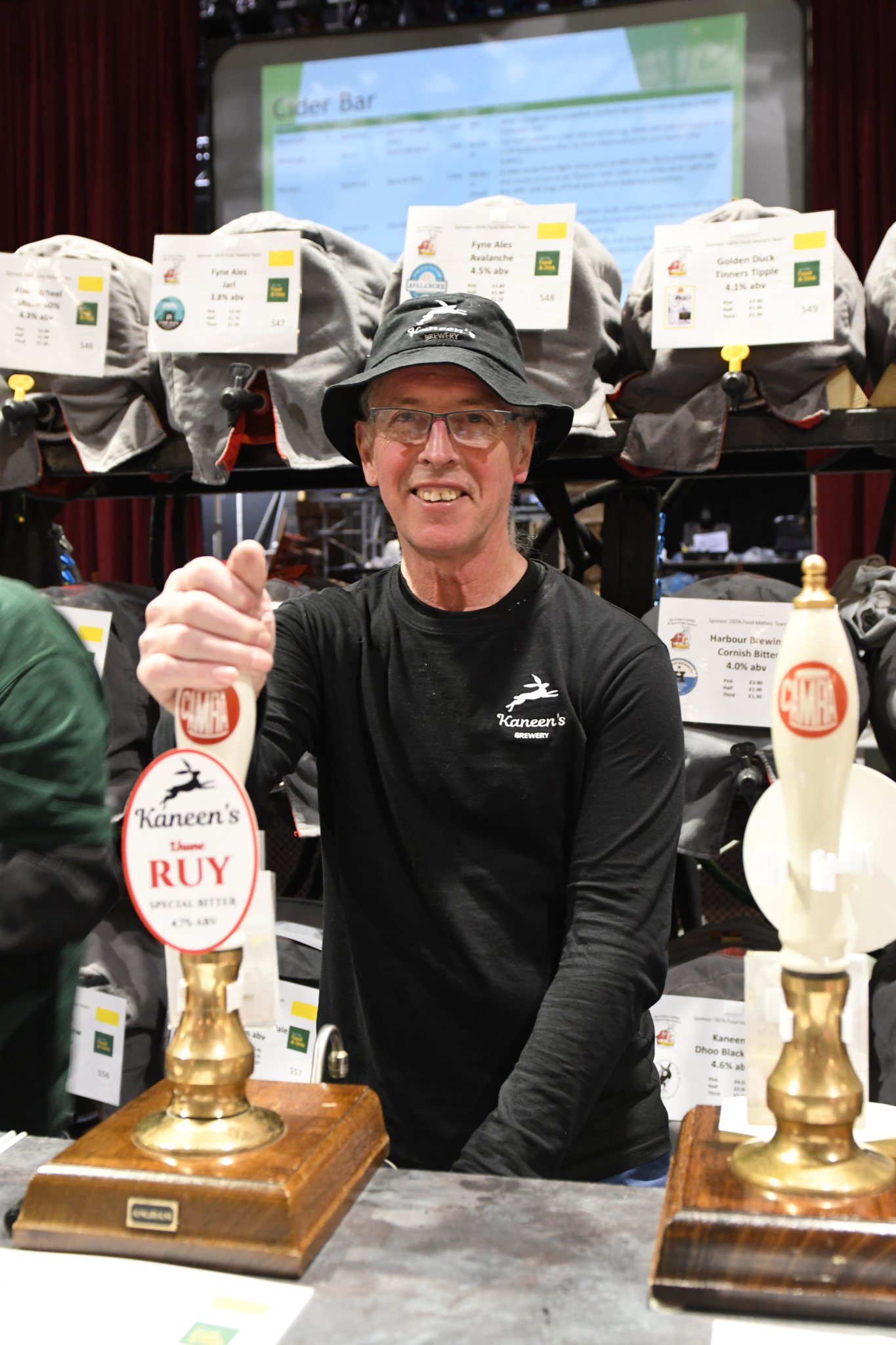The ninth Isle of Man Beer and Cider Festival - Kaneen’s brewery owner Peter Kaneen pours festival beer ‘Lhune Ruy’