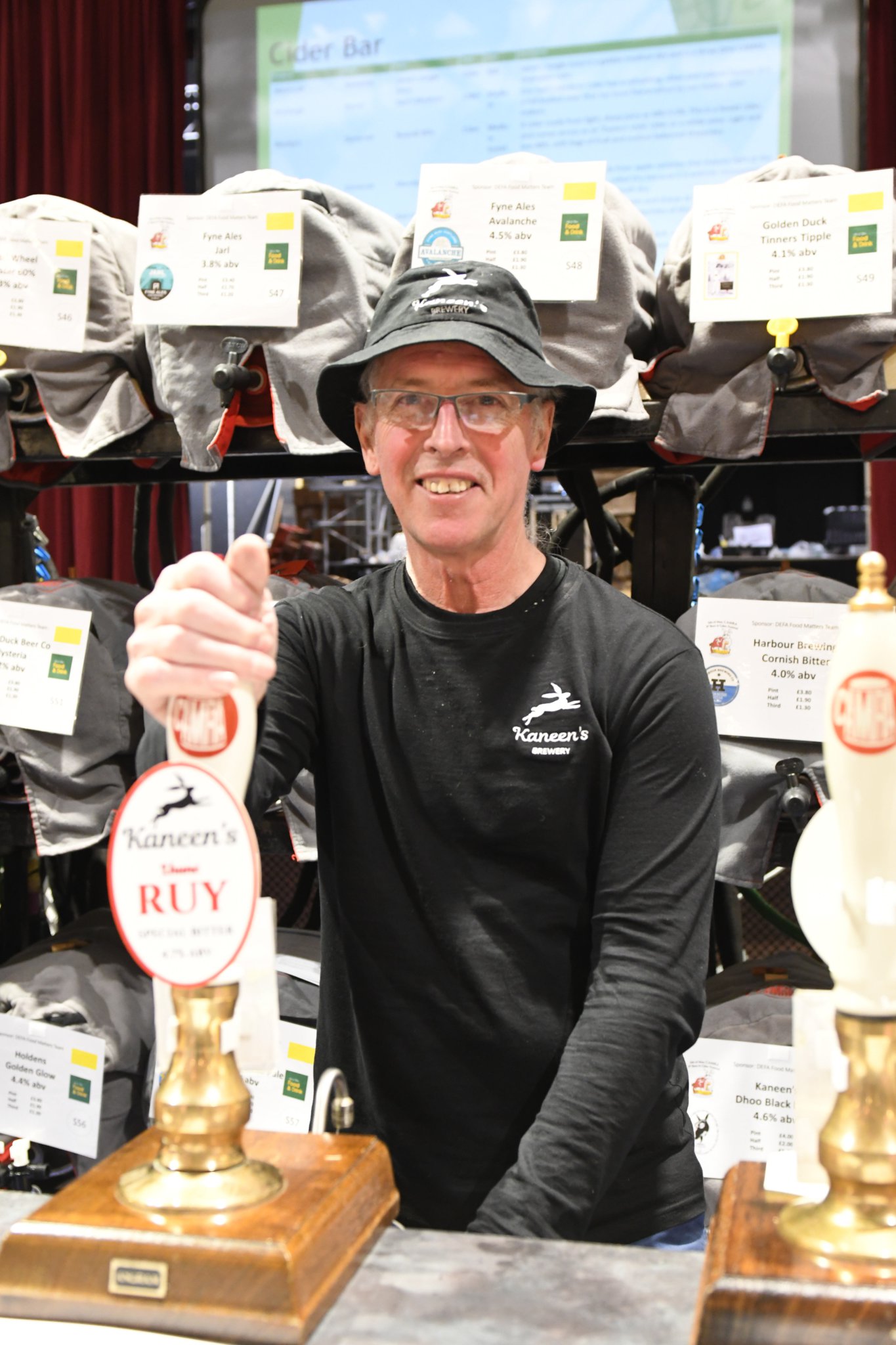 The ninth Isle of Man Beer and Cider Festival - Kaneen’s brewery owner Peter Kaneen pours festival beer ‘Lhune Ruy’